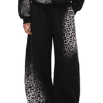 FDR Studios washed black baggy sweatpants with distressed leopard print accents