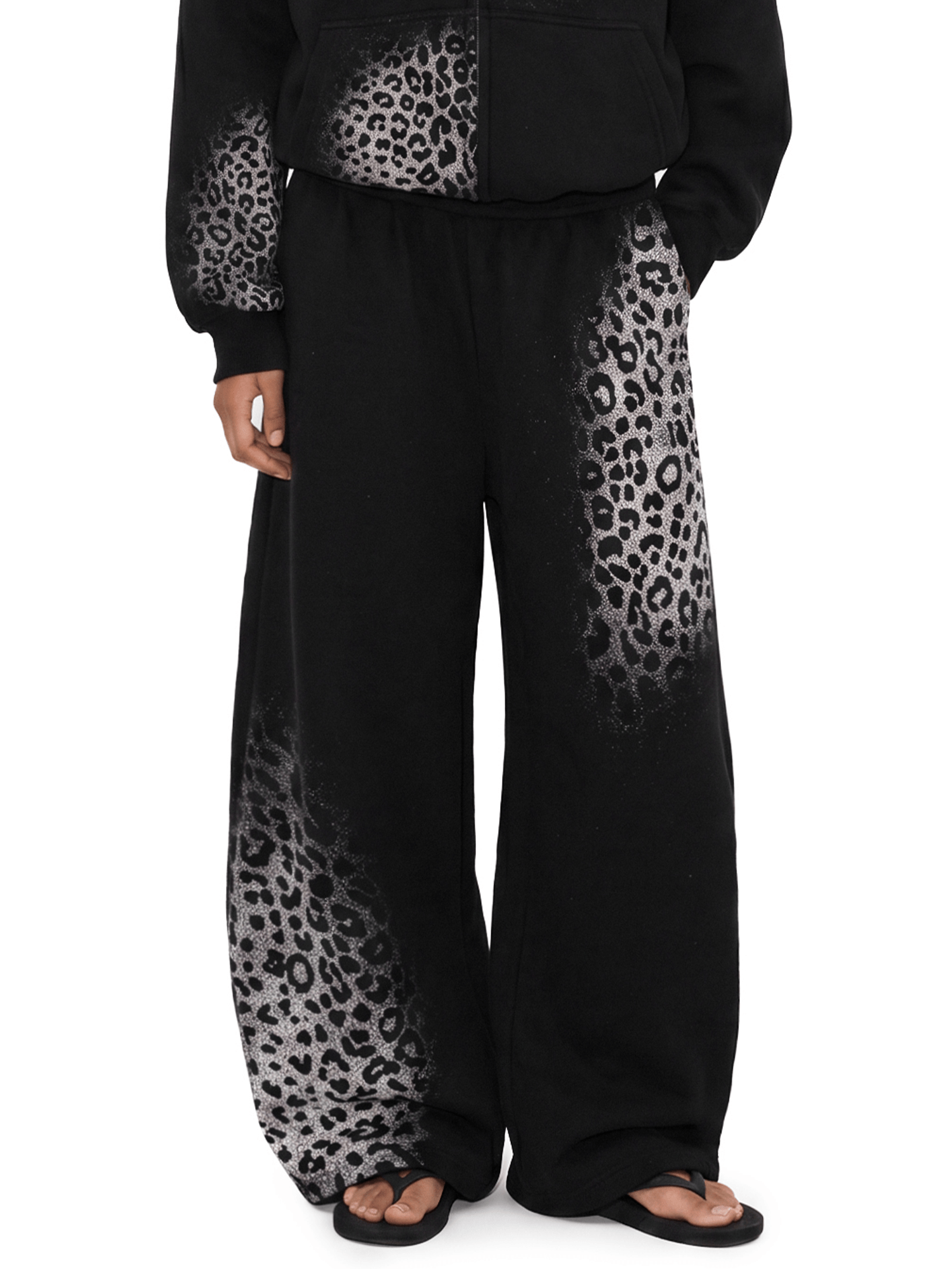 FDR Studios washed black baggy sweatpants with distressed leopard print accents