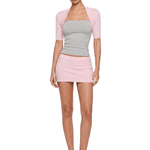 FDR Studios gray strapless top and baby pink micro mini skirt co-ord set with pink cropped bolero shrug