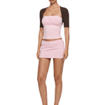 FDR Studios Cyber Y2K pink tube top and mini skirt set with brown short-sleeve bolero shrug shrug on model front view