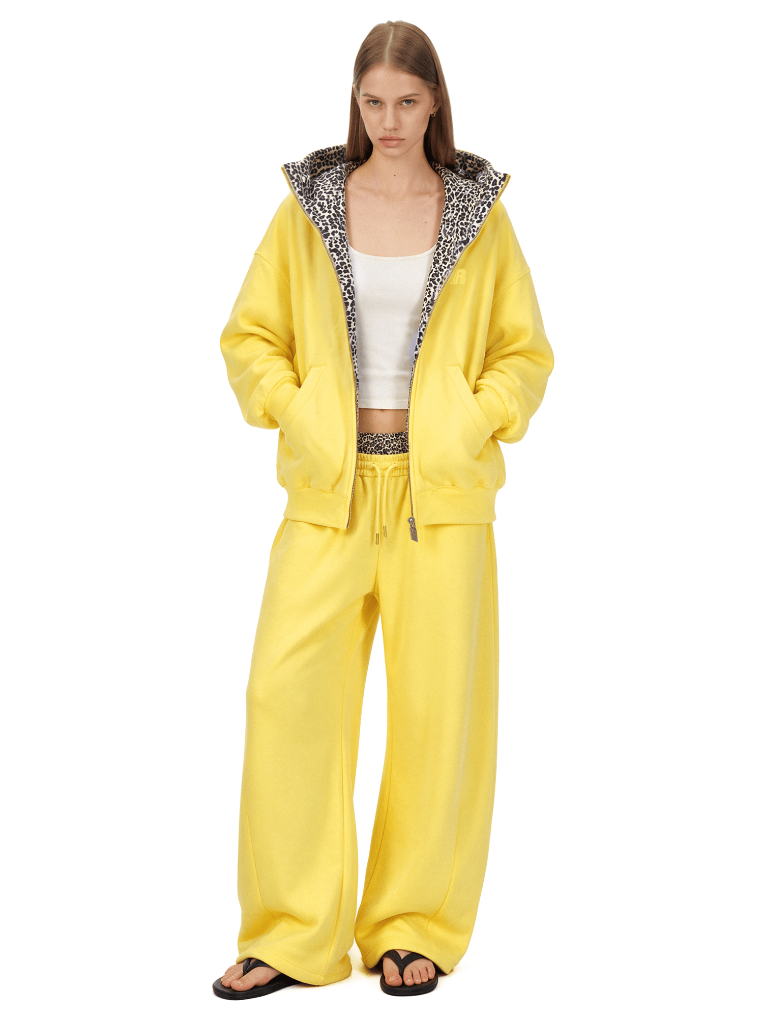 Front view of model wearing Eases Social Anxiety Leopard Hoodie in Black - FDR