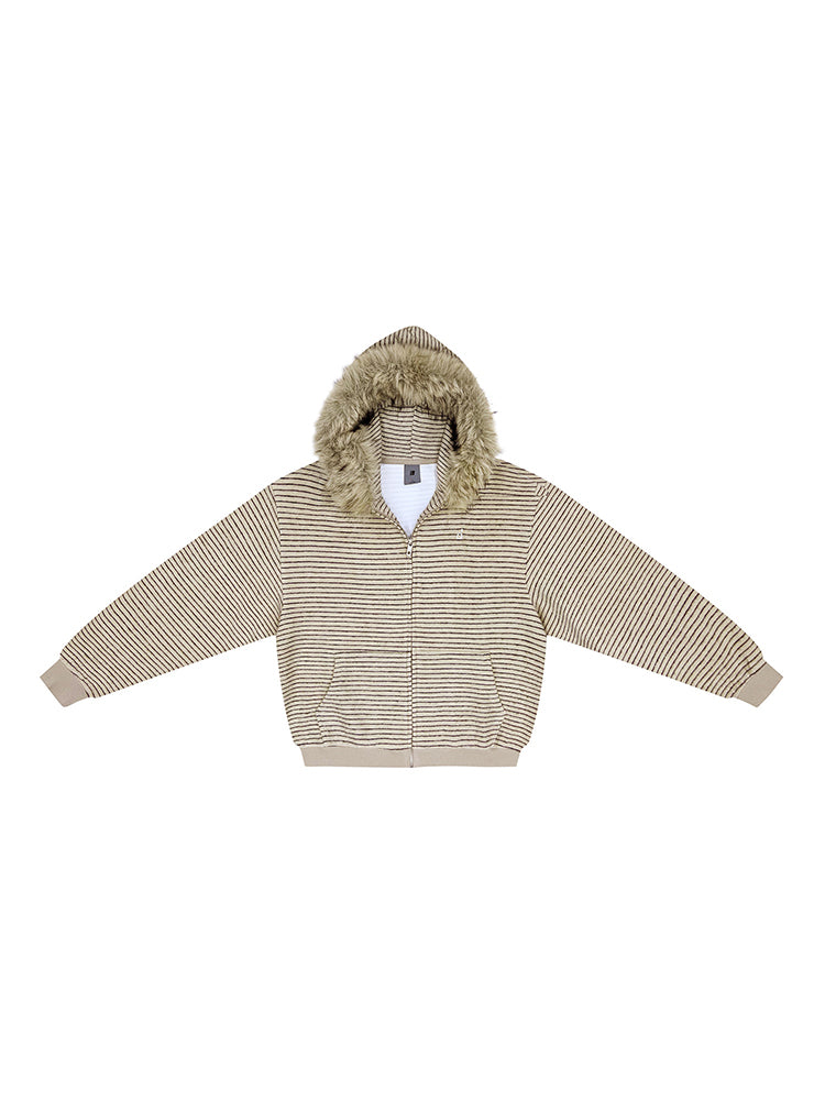 Flat lay of beige fuzzy hooded jacket, neutral edgy aesthetic for Gen Z streetwear.