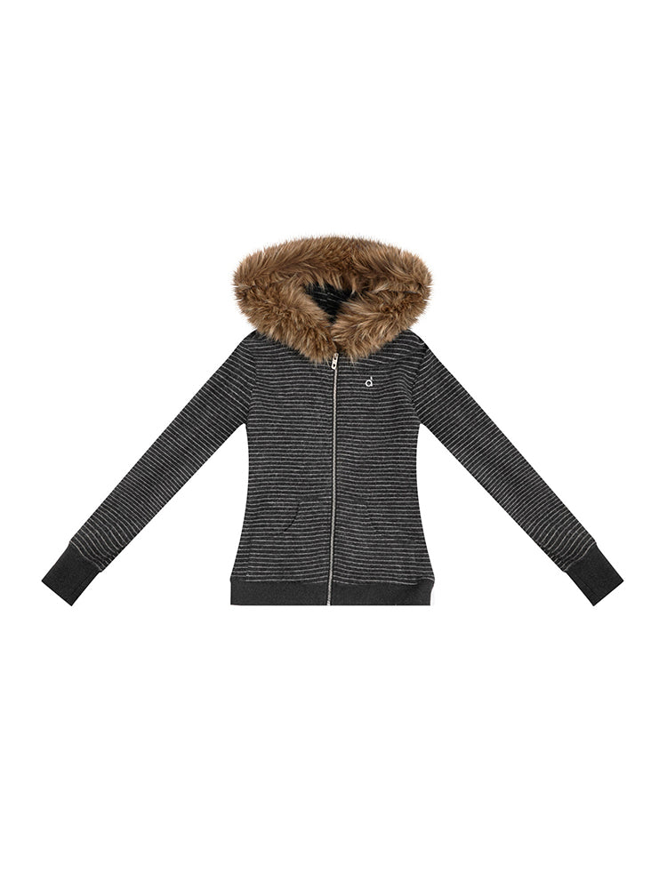 A product shot of the cream-colored ribbed-knit hooded jacket lying flat.