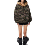 Straight-on full view of camo zip-up jacket showcasing Y2K high-street silhouette.