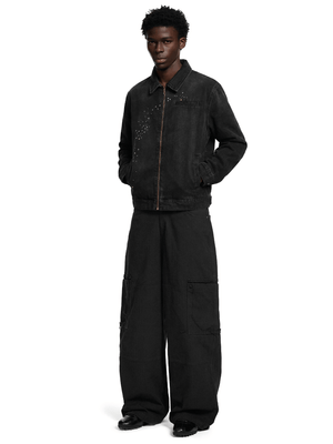Abgenutzte strassbesetzte Jeansjacke