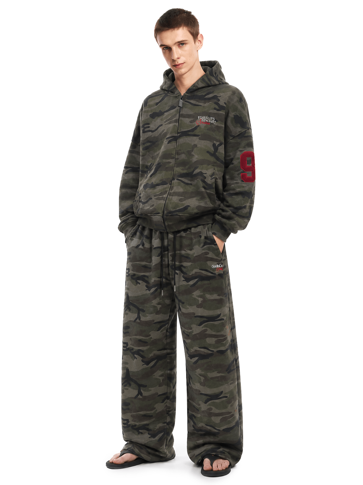 Back view of model wearing Camo Fleece Zip-Hoodie in Camouflage - FDR