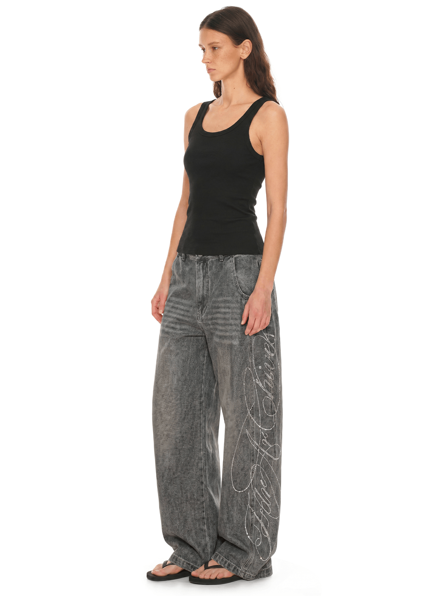 Back view of model wearing Vintage Rhinestone Baggy Denim in Washed Gray - FDR