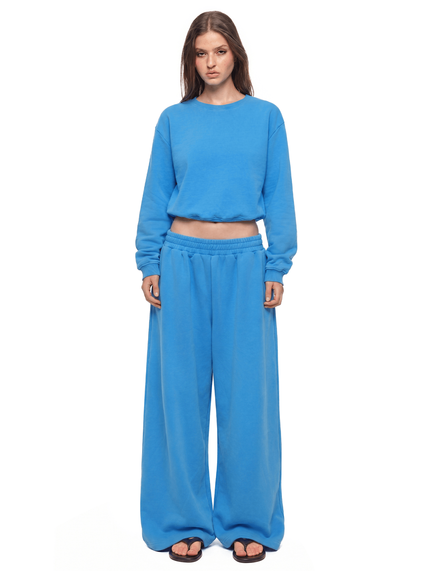 Back view of model wearing Urban Cobalt Washed Sweatpants in Lake Blue - FDR