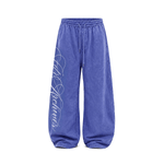 Royal blue wide-leg sweatpants with relaxed oversized fit and script logo