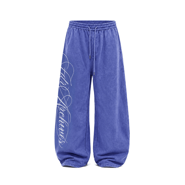 Royal blue wide-leg sweatpants with relaxed oversized fit and script logo