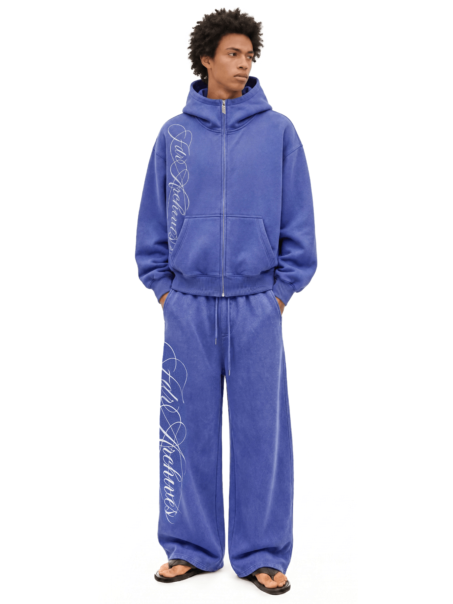 Royal blue oversized hoodie set with matching wide-leg sweatpants, front view on model