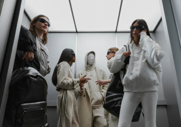 FDR Cyber Y2K fashion group in an elevator wearing oversized unisex style and minimalist sport style outfits