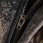 Macro shot of premium metal zipper and heavy washed fabric texture on FDR Studios techwear pants.