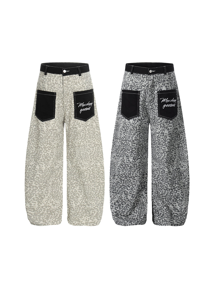 Side-by-side comparison of light khaki and dark grey leopard print wide-leg trousers.