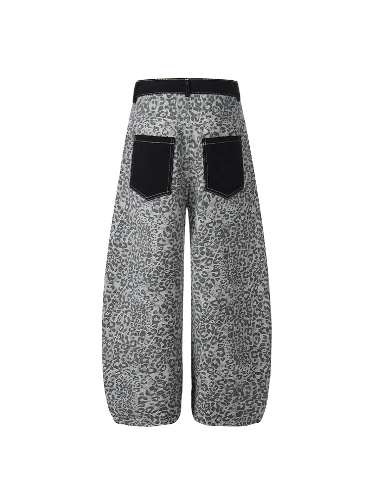 Rear view of grey leopard print streetwear pants with symmetrical black back pockets.