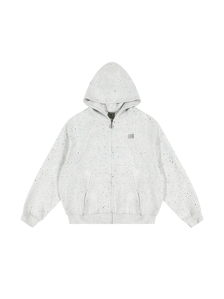 Front view of light gray marled zip up hoodie with confetti star design