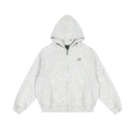 Front view of light gray marled zip up hoodie with confetti star design