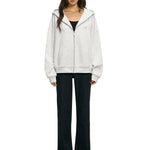 Full body streetwear look with light gray oversized zip up and wide leg pants