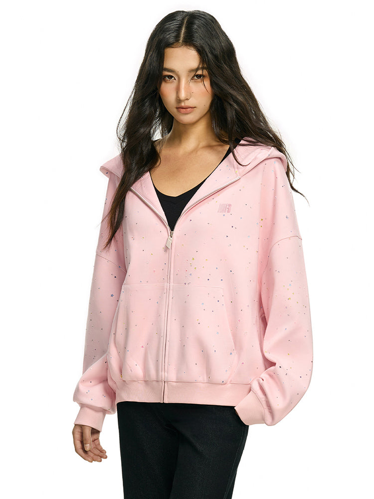 Side profile of pink star zip up hoodie with premium marled fleece texture