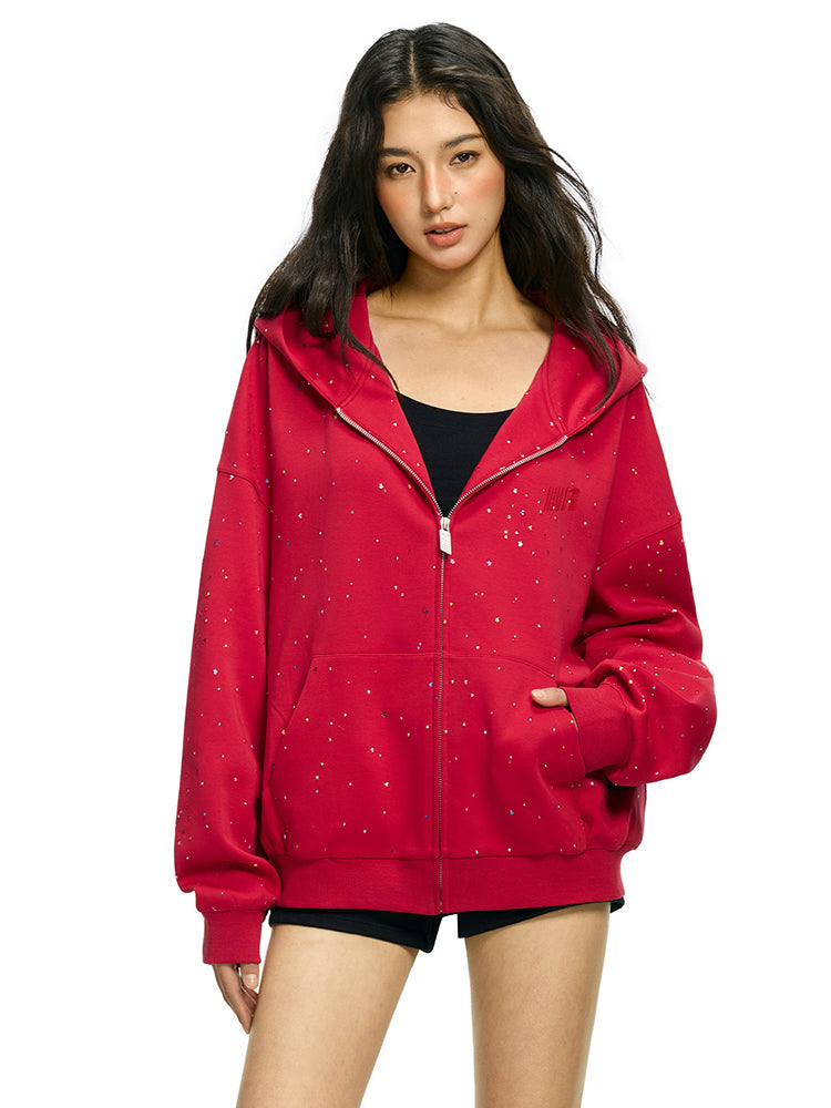 Front view of baggy red zip up hoodie with kanga pockets and rhinestone stars