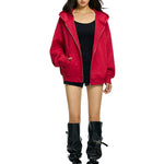 Front flat lay of red zip up hoodie with confetti dot detailing and star motif