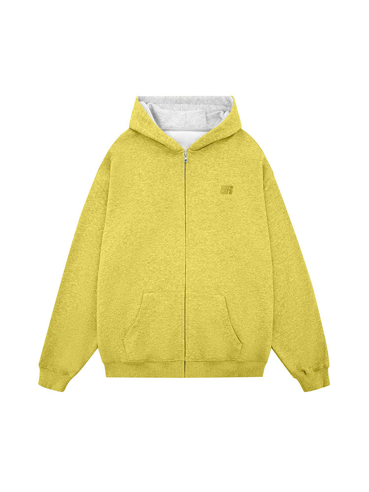 Flat lay of a yellow streetwear zip-up jacket with white contrast interior and drop shoulder design.