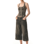FDR Studios grunge industrial brown graphic halter top and faded washed mud-dyed wide-leg cropped culottes pants on model.