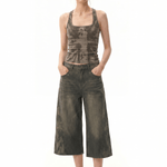 FDR Studios Y2K cyber aesthetic halter corset camisole paired with tactical avant-garde brown cropped sweatpants.