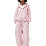 FDR independent brand pastel pink heavyweight full-zip hoodie and baggy sweatpants set on female model, cozy minimal luxury streetwear essentials.