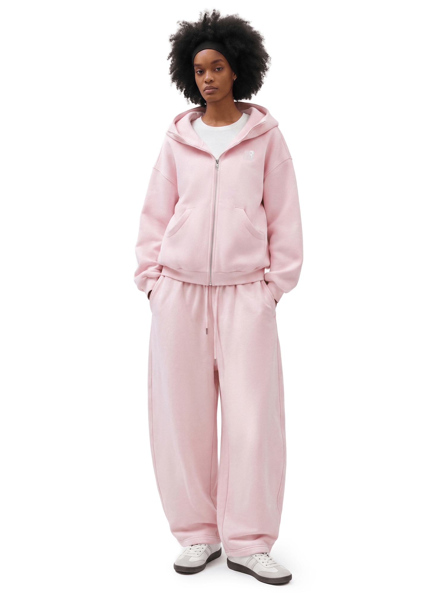 FDR independent brand pastel pink heavyweight full-zip hoodie and baggy sweatpants set on female model, cozy minimal luxury streetwear essentials.
