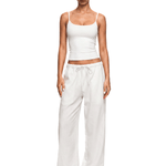 FDR industrial minimalist cream white spaghetti strap tank top paired with matching off-white relaxed sweatpants.