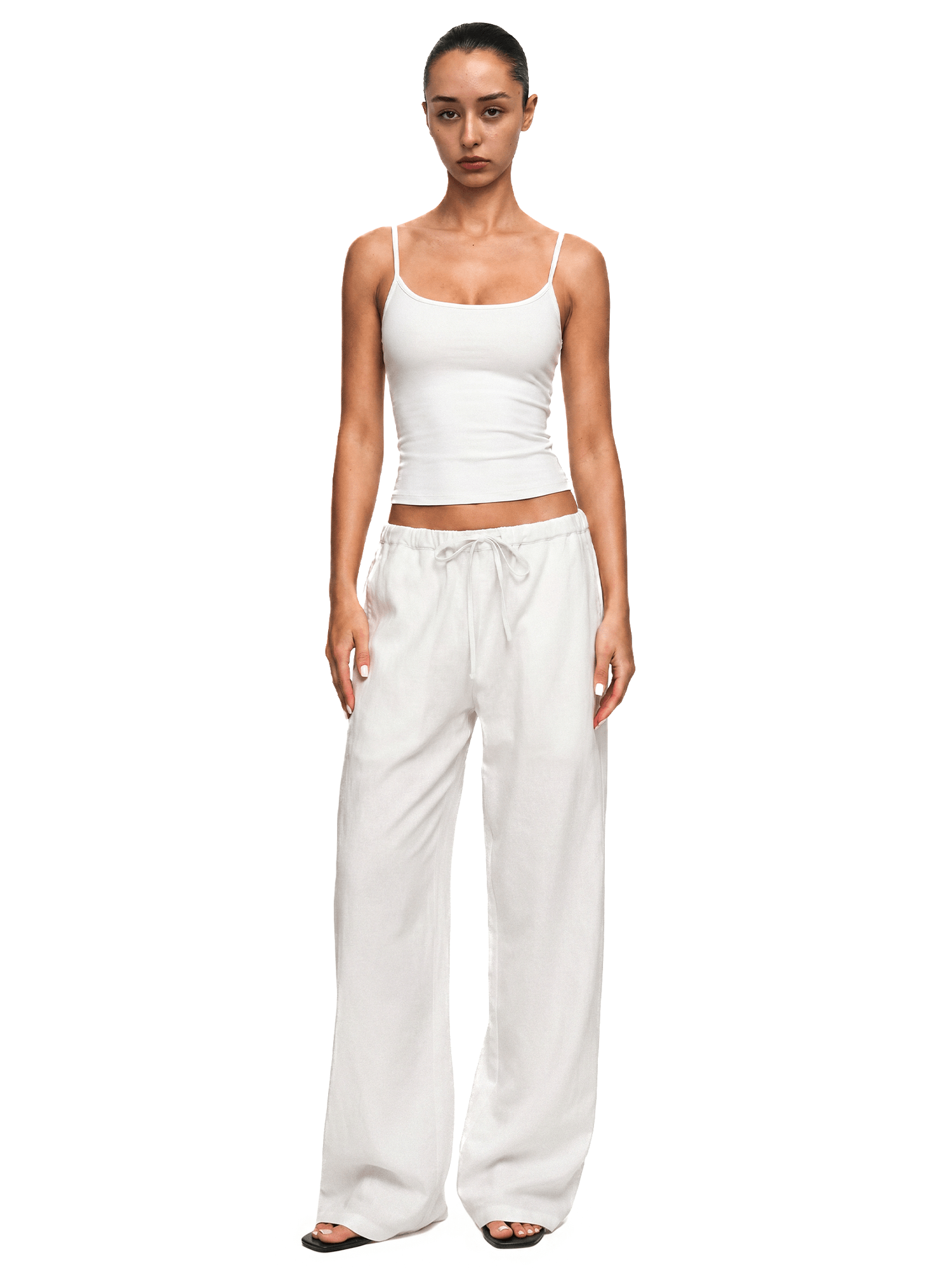 FDR industrial minimalist cream white spaghetti strap tank top paired with matching off-white relaxed sweatpants.