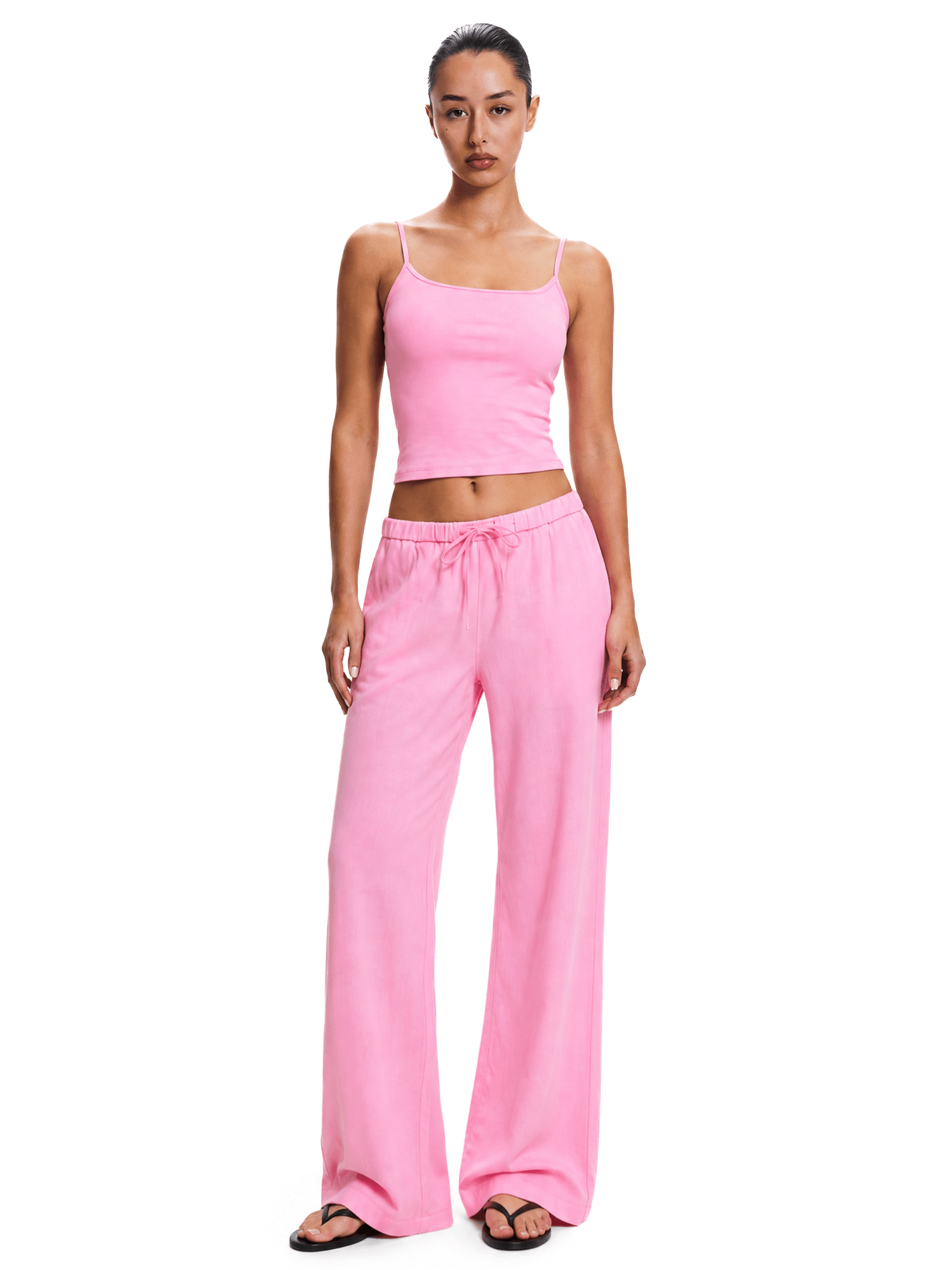 FDR Y2K candy pink cami top and matching vibrant pink slouchy wide-leg lounge pants on model.
