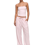 FDR Y2K light pink tube top and matching pastel pink slouchy wide-leg lounge pants on model.