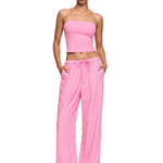 FDR bold cyber Y2K hot pink tube top and vibrant magenta wide-leg lounge pants on model.