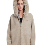 Cyber Y2K aesthetic apricot knit jacket featuring industrial minimalist design and cozy fur trim.