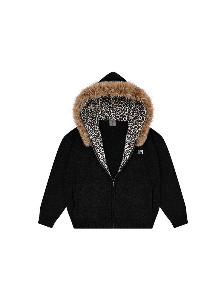 Industrial minimalist black oversized hoodie with premium fur trim and leopard pattern.
