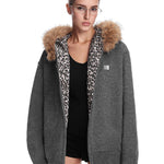 Close-up of FDR Studios dark grey hoodie showing faux fur hood and leopard print detail.
