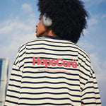 Flat lay professional shot of HypeCord black and white fine striped sweatshirt.