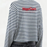 Close-up back view of FDR Studios striped long-sleeve tee featuring "HypeCord" red logo embroidery on the upper back.