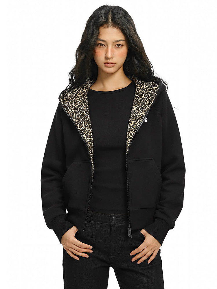 FDR cropped zip-up hoodie showing leopard interior and black base layer styling.