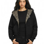 FDR cropped zip-up hoodie showing leopard interior and black base layer styling.