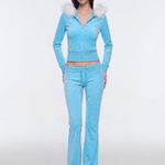Model wearing light blue cropped plush zip hoodie with white faux fur collar