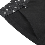 Detail shot of the side pocket and silver-tone rivet hardware on black heavy-duty cotton trousers.