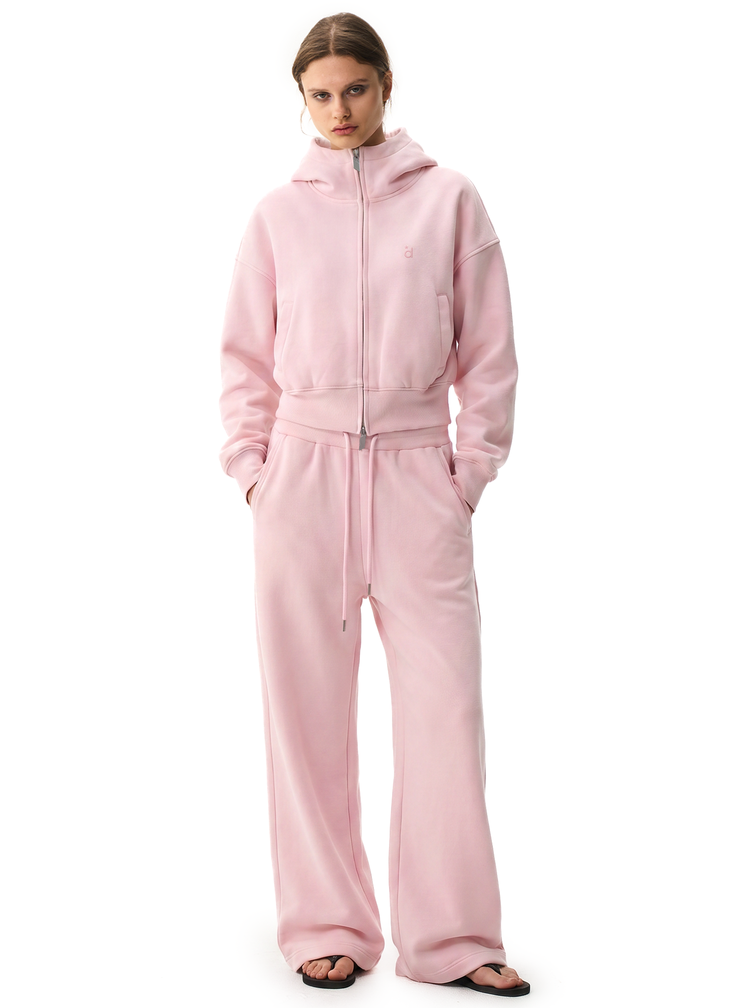Pastel pink cropped hoodie with big hood, genderless boxy fit streetwear, high-street aesthetic.