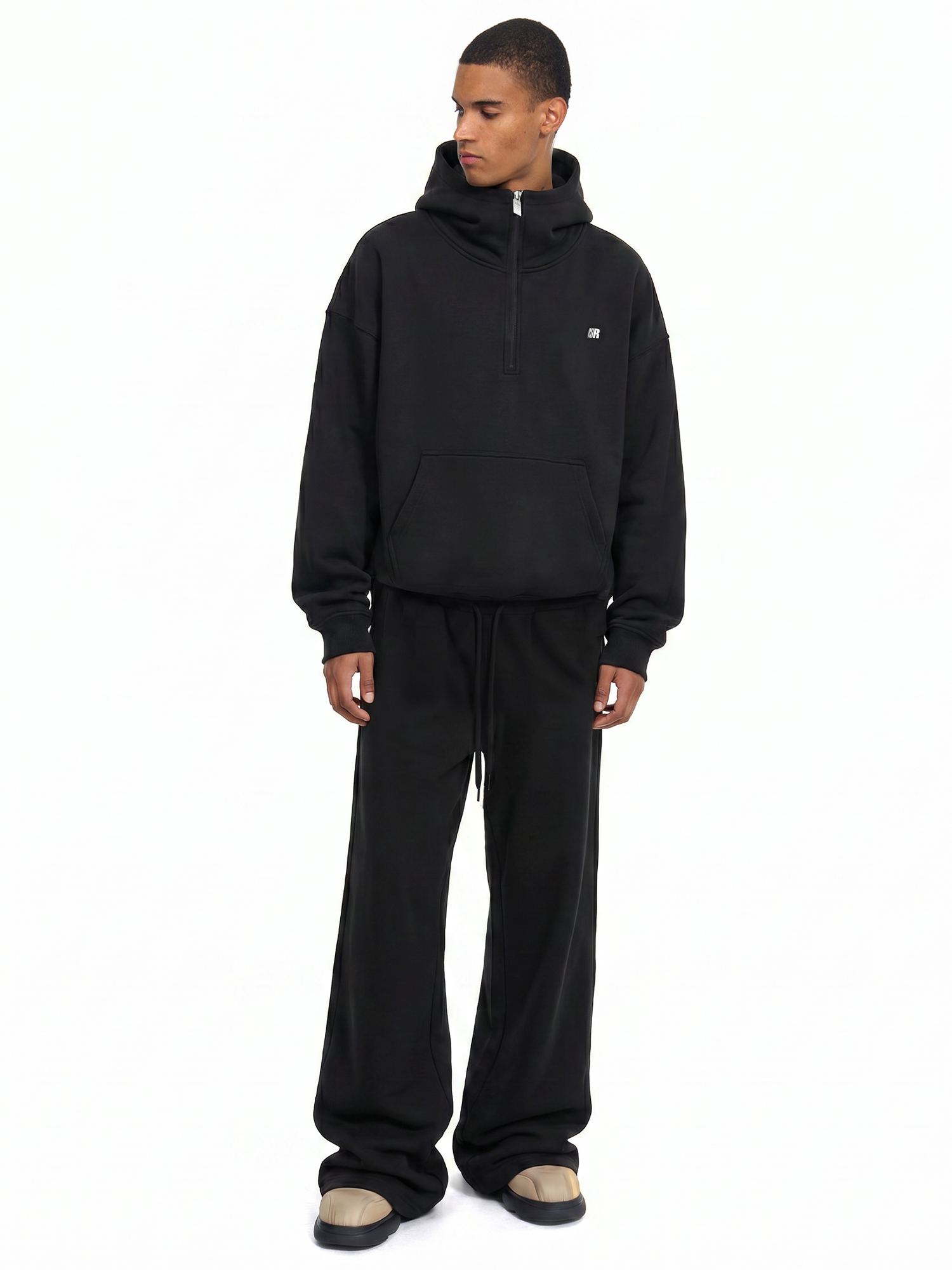 Men's high street black techwear tracksuit set featuring heavyweight half-zip hoodie.