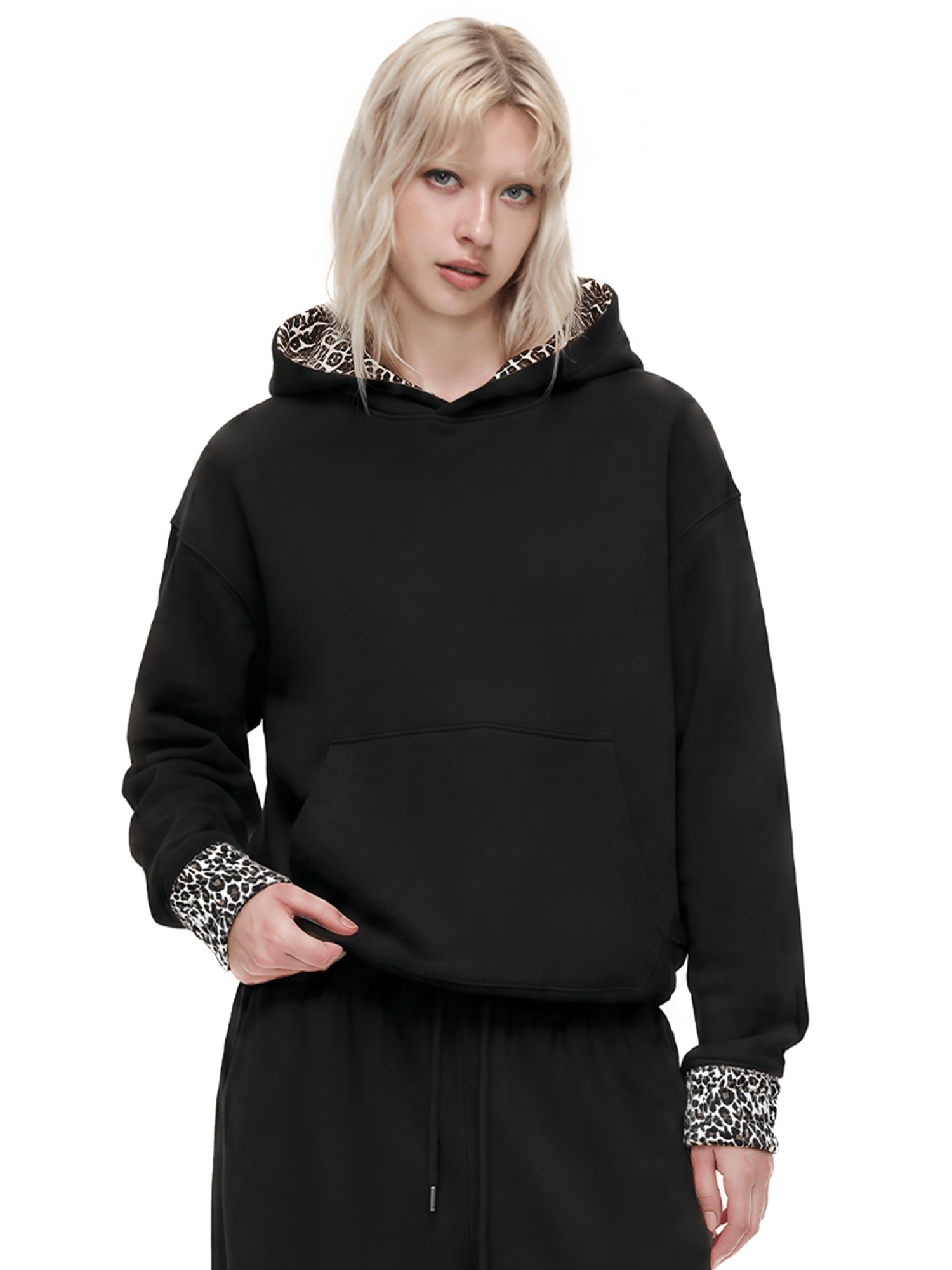 close up of techwear black boxy cropped hoodie with custom matte metal zipper and double layered hood details
