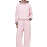 genderless soft pink oversized crop pullover hoodie and wide leg pooling trackpants with leopard patchwork accents