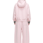 back view of cloud leopard deconstructed pink cropped hoodie showing heavy weight double layered hood techwear aesthetic