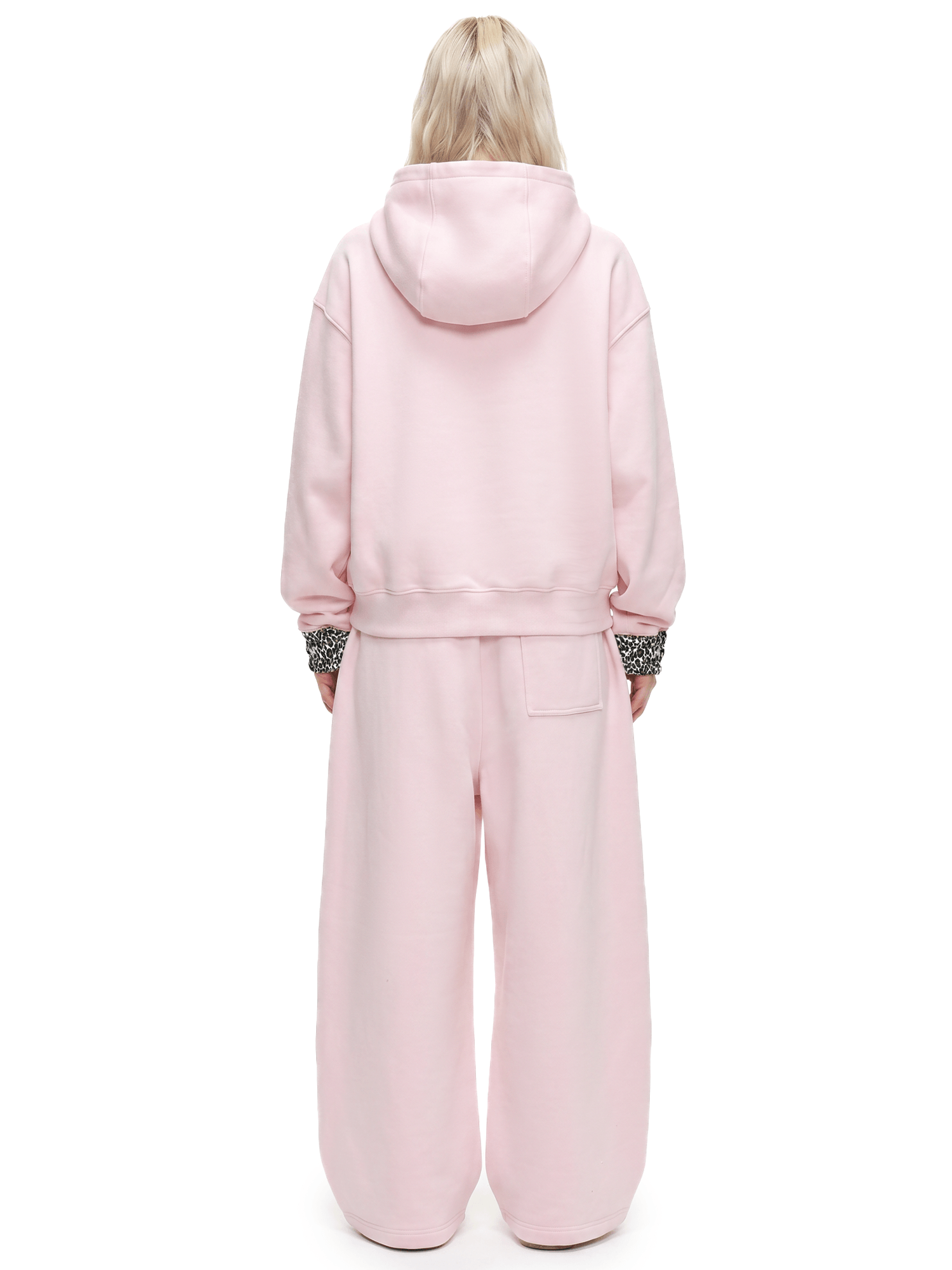 back view of cloud leopard deconstructed pink cropped hoodie showing heavy weight double layered hood techwear aesthetic